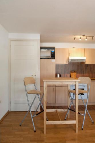 Ferienhaus Opi Huck Stroot 24 - carbon neutral hotel in Dorum