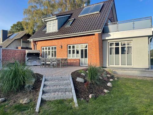 Ferienhaus Tage am Meer 3 SZ 3 Bäder mit Dachterrasse by Unsere Urlaubszeit in Kellenhusen, Germany