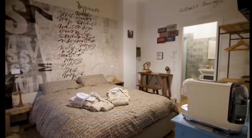 Happiness Suite Gallery Appartamento con Sauna Bed Art Relaxing Suite — 4-Star Luxury Hotel in San Benedetto Del Tronto, Italy