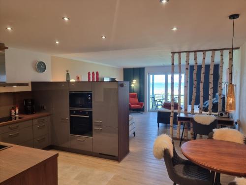 Steiner Strandappartements Appartement 204 Seeseite — 4-Star Luxury Hotel in Stein, Germany