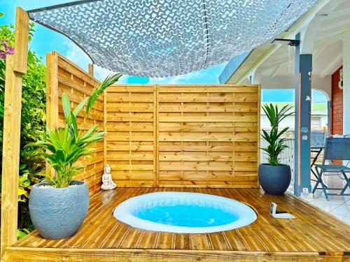 Lodge Sopraia Jardin spacieux Jacuzzi Proche aéroport — 4-Star Luxury Hotel in Les Abymes, Guadeloupe