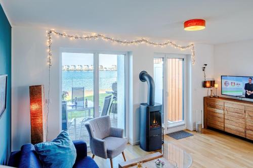 Ferienhaus Am Meer by Seeblick Ferien ORO direkte Wasserlage Sauna Kamin in Unknown City, Germany