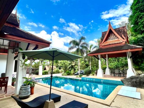 Villa Malee — 4-Star Luxury Hotel in Thai Mueang, Thailand