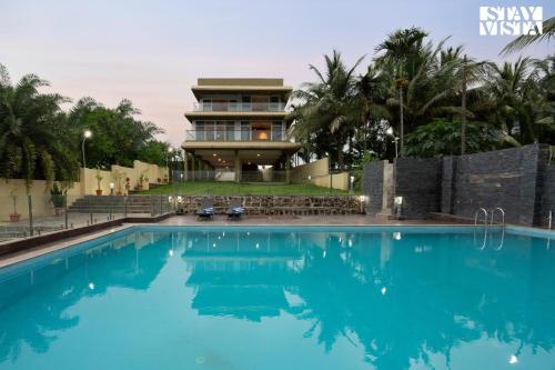 StayVista's Rivulet Waters Lakefront Villa with Infinity Pool Jacuzzi Lawn and Rustic Gazebo — 4-Star Luxury Hotel in Pune, India