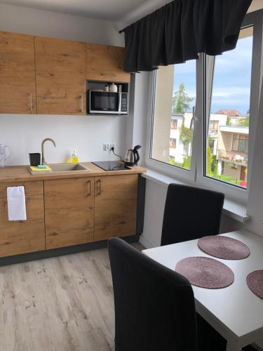 Apartamenty Młyńska Przygoda — 4-Star Luxury Hotel in Wladyslawowo, Poland