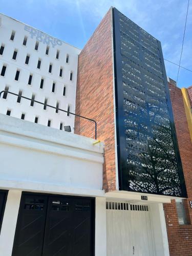 Edificio Tony Alojamiento Aparta Hotel
