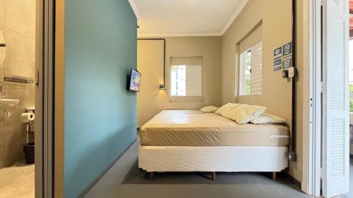 Suíte 15 Praia das Pitangueiras in Guaruja, Brasil