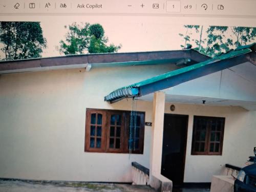 Mano illam - carbon neutral hotel in Unknown City
