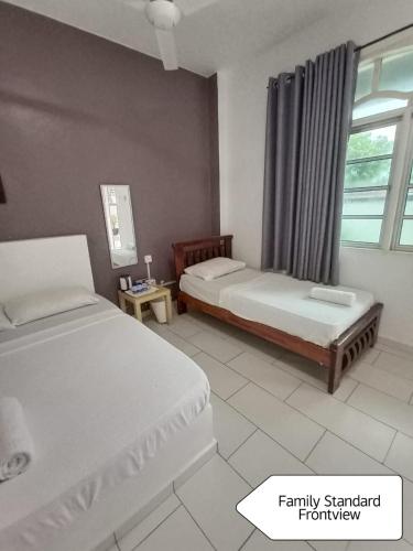 Aqil Beach Inn — Marang — photo 5