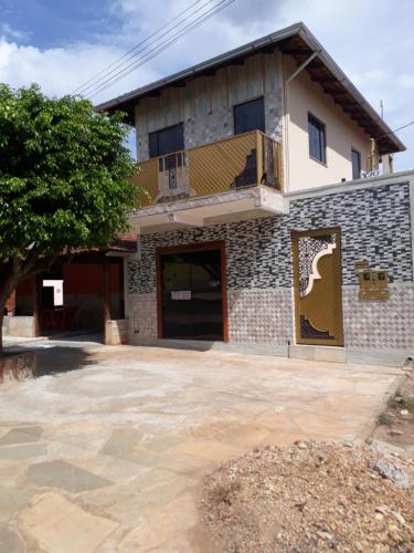 Suites Flor de Lis - carbon neutral hotel in Pirenopolis