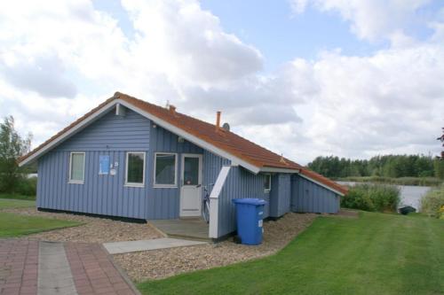 4 Personen Ferienhaus mit Kaminofen Kanu und herrlichem Seeblick in Otterndorf in Otterndorf, Germany