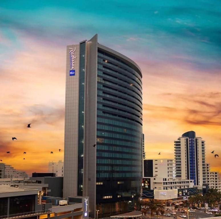 Umhlanga Luxury Promenade Suite at Oceans Apartments in Radisson Blu Hotel building tower Durban in Durban, South Africa