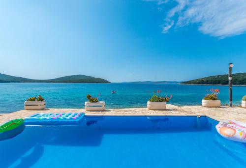 Seascape bungalow with terrace with seaview — 4-Star Luxury Hotel in Biograd Na Moru, Croatia