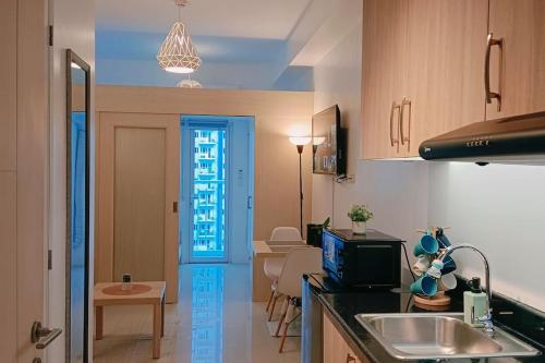 1BR Condotel with Balcony at SM Light Residences #LT04 — 4-Star Luxury Hotel in Manila, Philippines