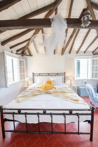 Traditional House under the Clock Tower with Sweet View in Poros, Greece