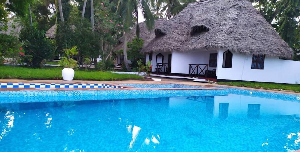 Menai Bay Beach Bungalows — 4-Star Luxury Hotel in Zanzibar, Tanzania