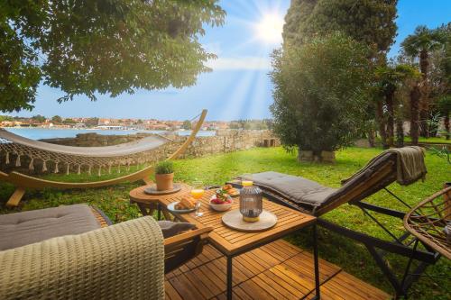 Exclusive Seafront Bacchus Apartment — 4-Star Luxury Hotel in Porec, Croatia
