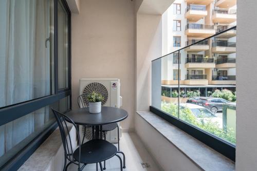 Luna Loft 1BR with Parking — 4-Star Luxury Hotel in Bucharest, Romania