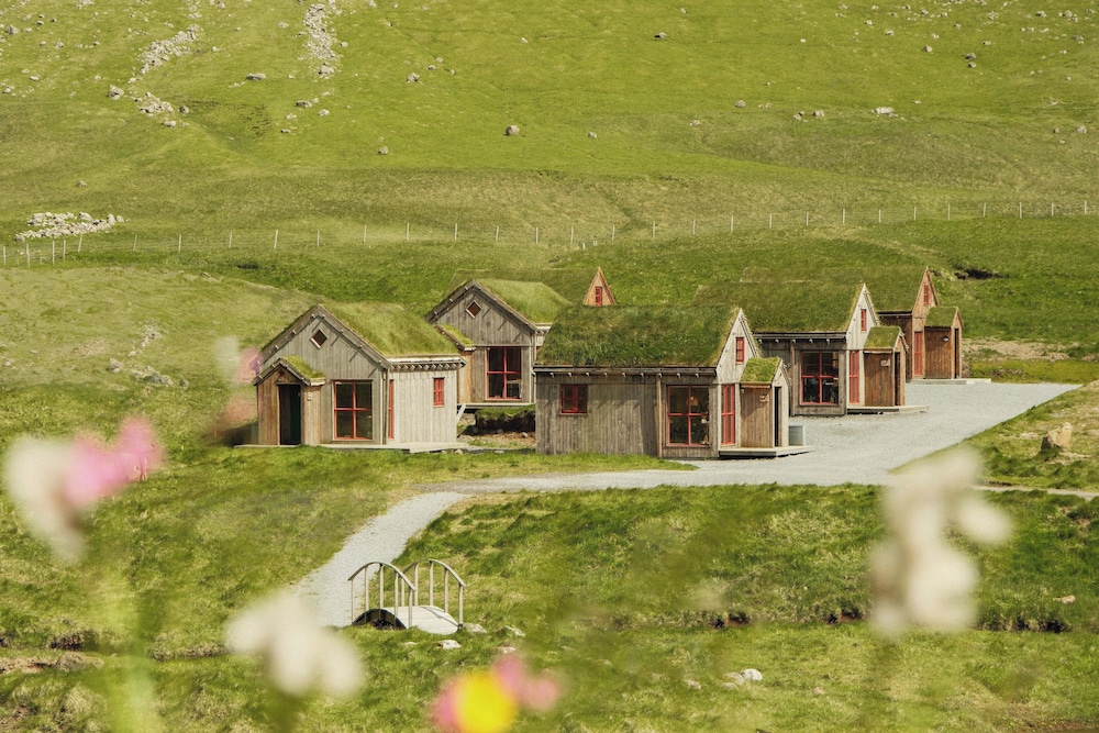 Múlafossur Cottages near Waterfall in Sorvagur, Faroe Islands
