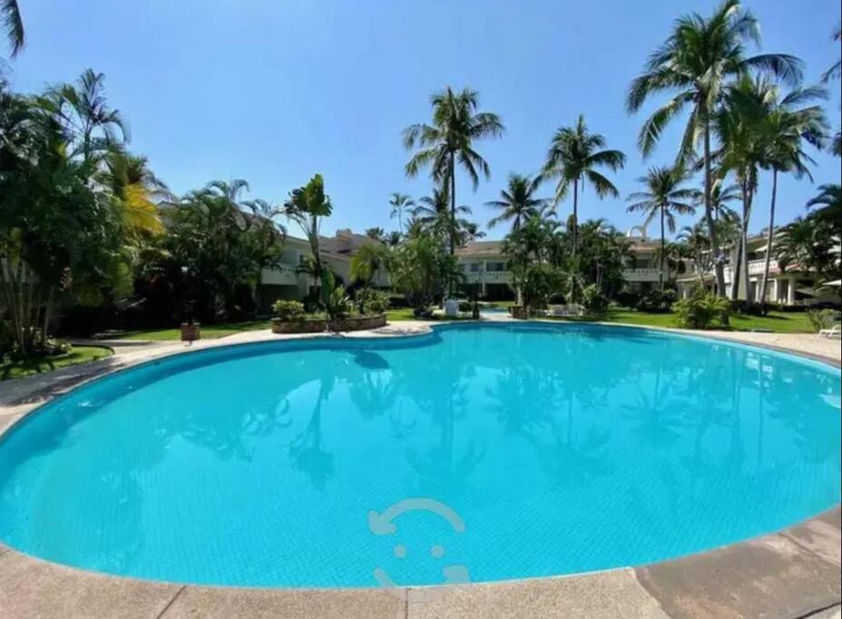 Hermoso apartamento en Manzanillo con alberca y cancha de tenis Ideal para relajarse y disfrutar de una escapada tranquila en el paraíso tropical — 4-Star Luxury Hotel in Manzanillo, Mexico