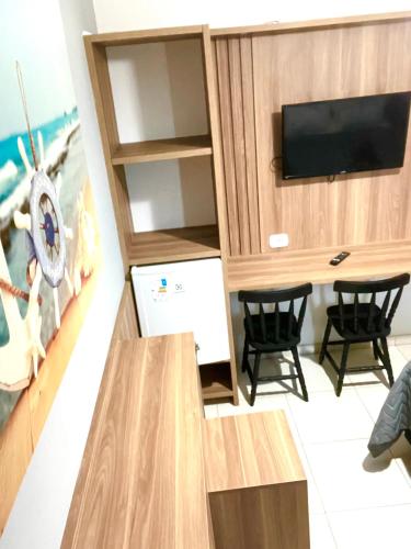Suíte 31 Privativa com ar condicionado Frigobar Vista lateral para o mar 5 mts da praia
