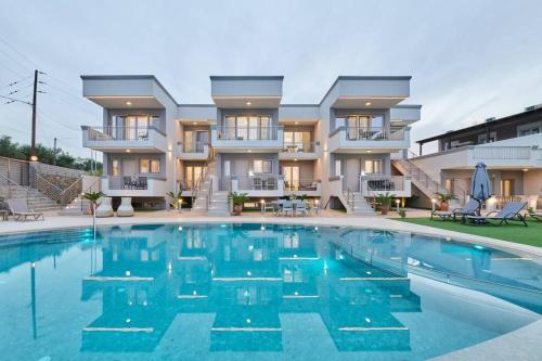 Superior family apartment w pool dining area — 4-Star Luxury Hotel in Rethymno, Greece