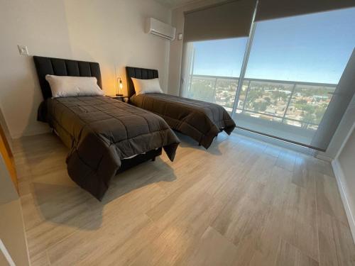 Apartamentos Belgrano Luxury — 4-Star Luxury Hotel in Neuquen, Argentina