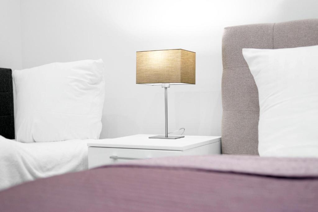 INVAL by ROCKCHAIR Apartments l SUPERHOST Status l 2 Bedrooms Boxspringbeds 2 Bathrooms in City Center Mitte Cozy Maisonette Family & Business Flair welcomes you — 4-Star Luxury Hotel in Berlin, Germany