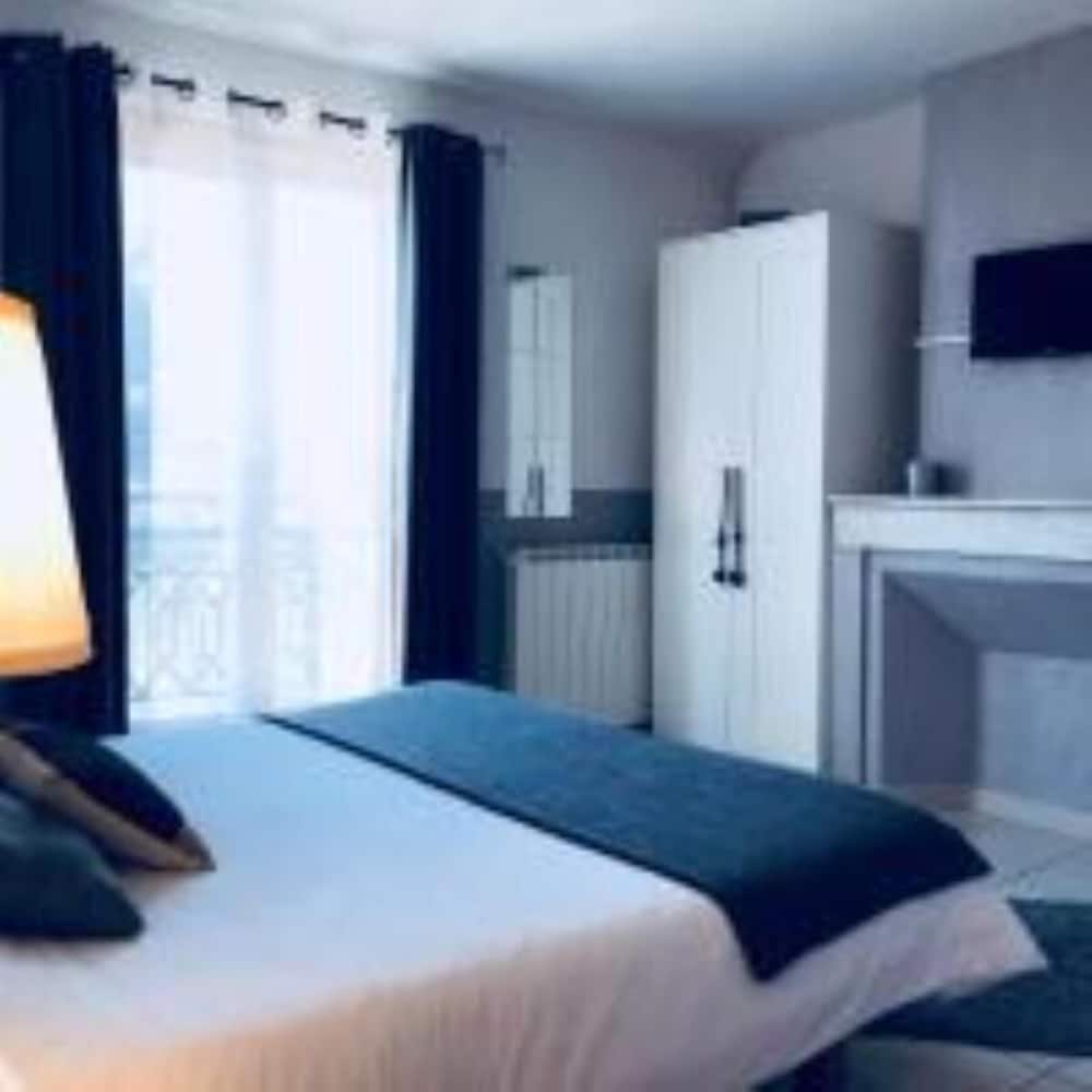 Le Clos Des Acacias — Signes