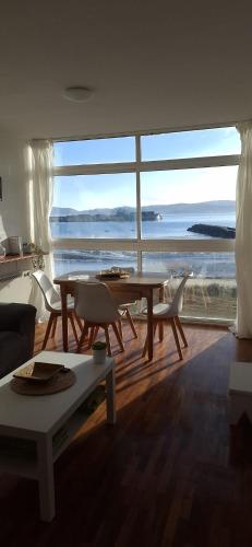 Piso Primera Linea de Playa Y Vistas Al Mar En Carino in Carino, Spain