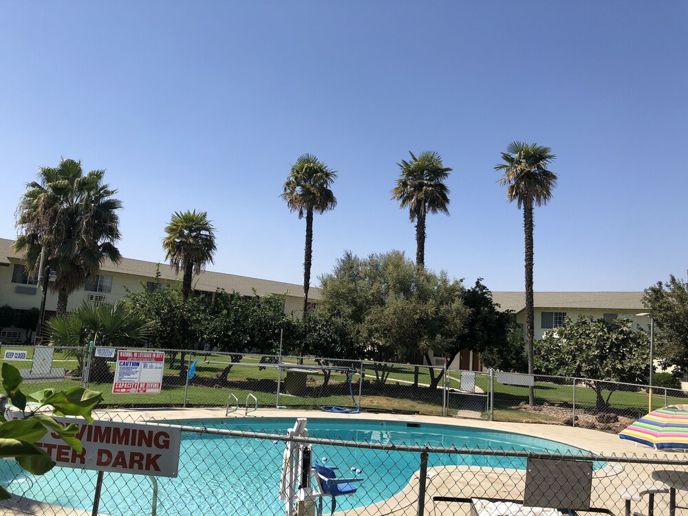 99 Palms Inn & Suites - photo 27
