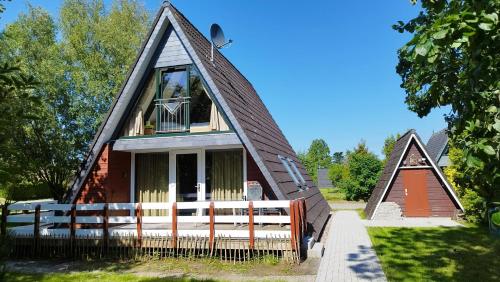 Nurdachhaus Fuxbau