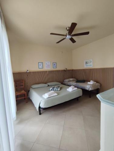 Casa con ampio terrazzo vista lago e giardino — 4-Star Luxury Hotel in Toscolano Maderno, Italy