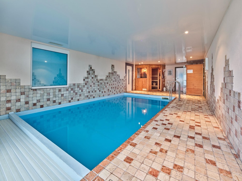 Tasteful holiday home with private pool — 4-Star Luxury Hotel in Hellenthal, Germany