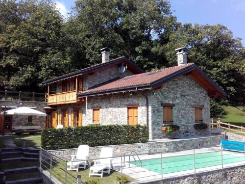 La Dolce Vita chalet — 4-Star Luxury Hotel in Massino Visconti, Italy