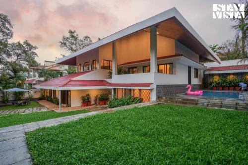 StayVista's Casa Ember Relax with a Pool Table Gazebo and Inviting Swimming Pool — 4-Star Luxury Hotel in Lonavla, India