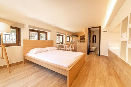 Angela's Guest House by AegianKazarte — 4-Star Luxury Hotel in Aegina, Greece