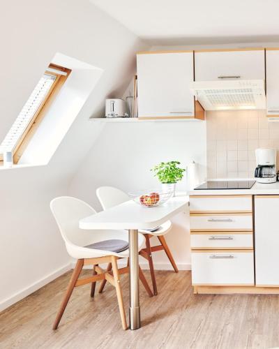 Ferienwohnung mit Balkon in zentraler und ruhiger Lage — 4-Star Luxury Hotel in Busum, Germany