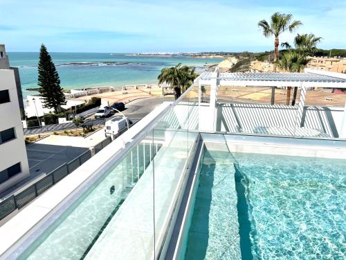GATU PREMIUM Sandia Beach lujo junto al mar parking y piscina comA n SA3lo familias o grupos demayores de 25 aA os in El Puerto De Santa Maria, Spain