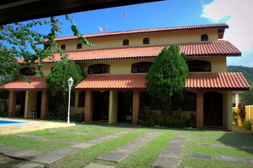 Chalé Massaguaçu — 4-Star Luxury Hotel in Caraguatatuba, Brasil