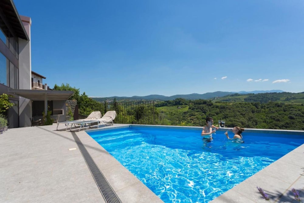 Villa Eva — 4-Star Luxury Hotel in Dobrovo, Slovenia