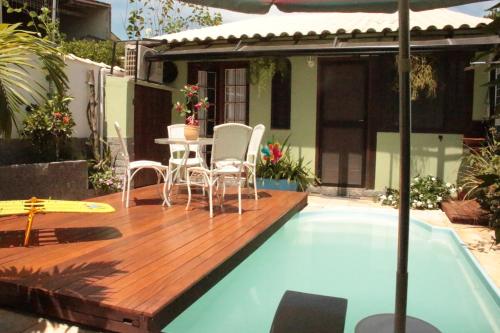 Boechat Loft 300m da praia 2 quartos piscina privativa jardim in Marica, Brasil