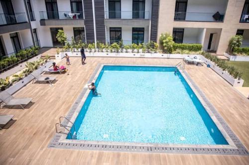 Classic Suite at Embassy Gardens W pool view — 4-Star Luxury Hotel in Accra, Ghana