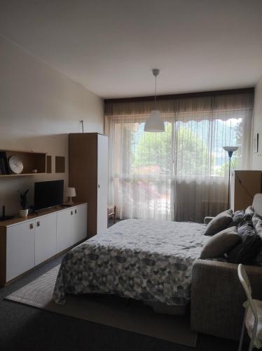 LFSUITE LuganoLake Terrazza Spiaggia privata Parking WI FI Netflix — 4-Star Luxury Hotel in Porlezza, Italy