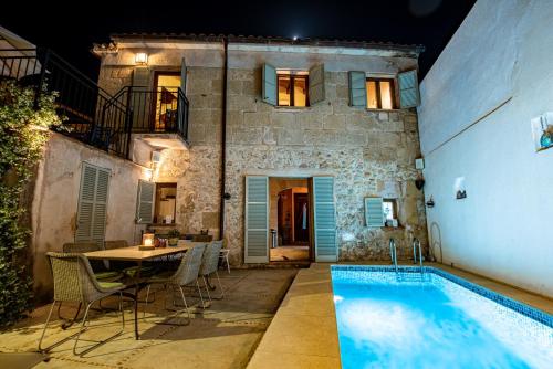Townhouse Albuqassim by Homevillas360 — 4-Star Luxury Hotel in Pollenca, Spain