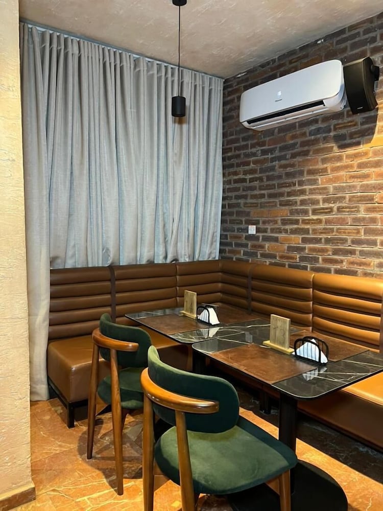 7Even Suites - carbon neutral hotel in Unknown City