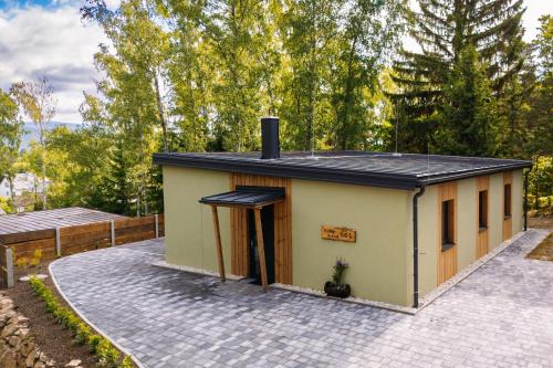 Chaty Velas - carbon neutral hotel in Hroznetin