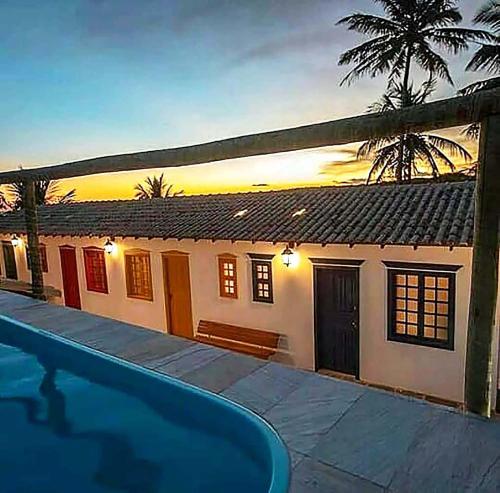 Suite em pousada no ES com lazer completo e WiFi in Guarapari, Brasil