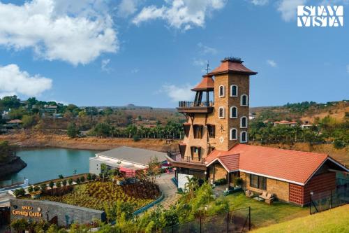 StayVista's Cerenity Castle Lakeside Haven with Hill View Terrace & Indoor Entertainment — 5-Star Luxury Hotel in Nashik, India