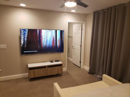 Luxury Villa with bonus pool house Private Pool Hot tub rock water fall and slide putting green basketball shuffle board play gym privately gated on circular driveway.